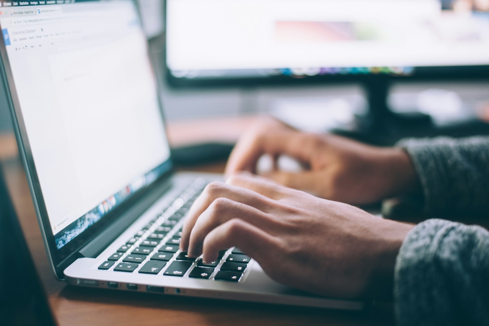 Laptop and notebook for planning a small paid side offer