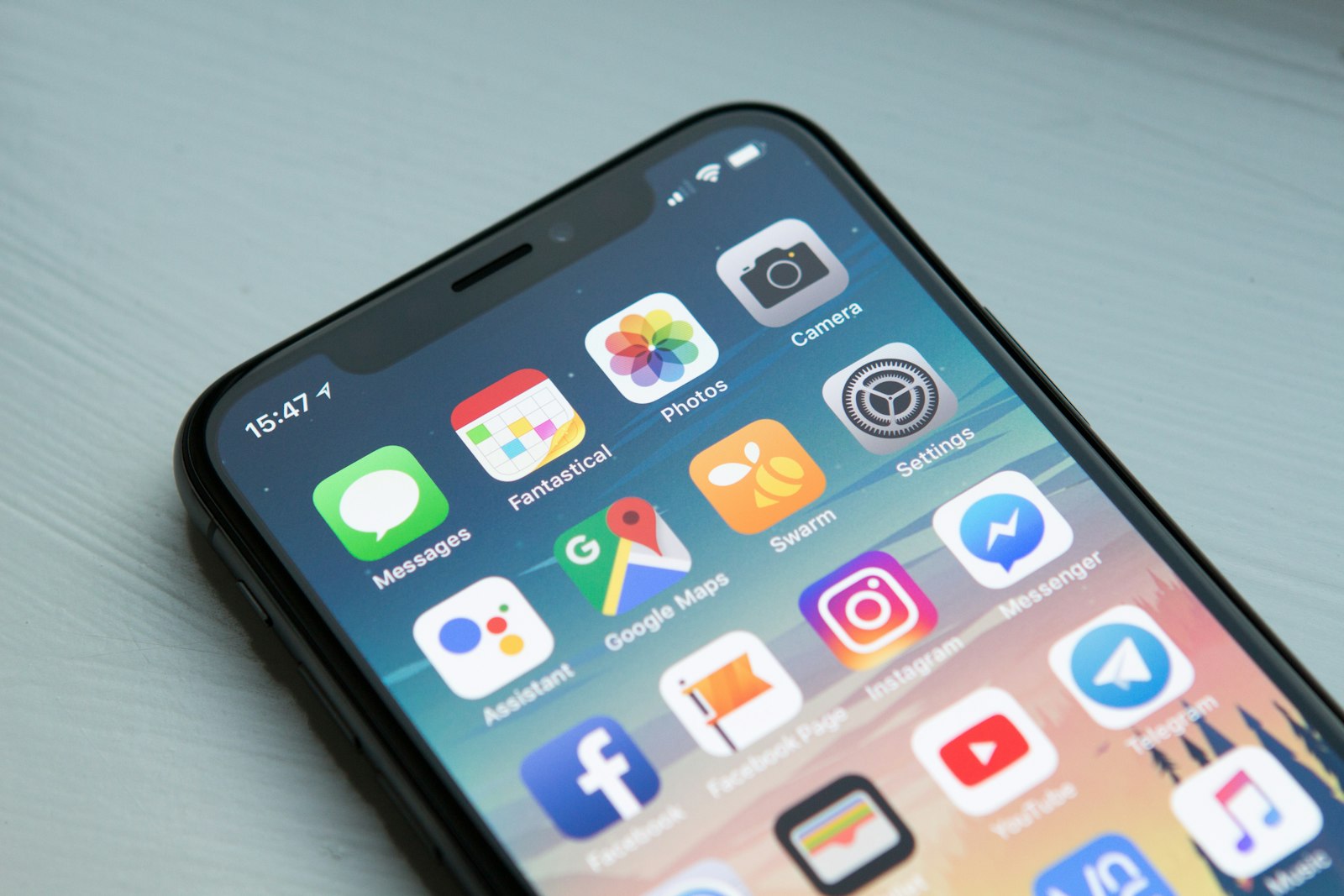 Person reviewing money apps on a smartphone